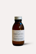 Brown bottle with a label on a white background