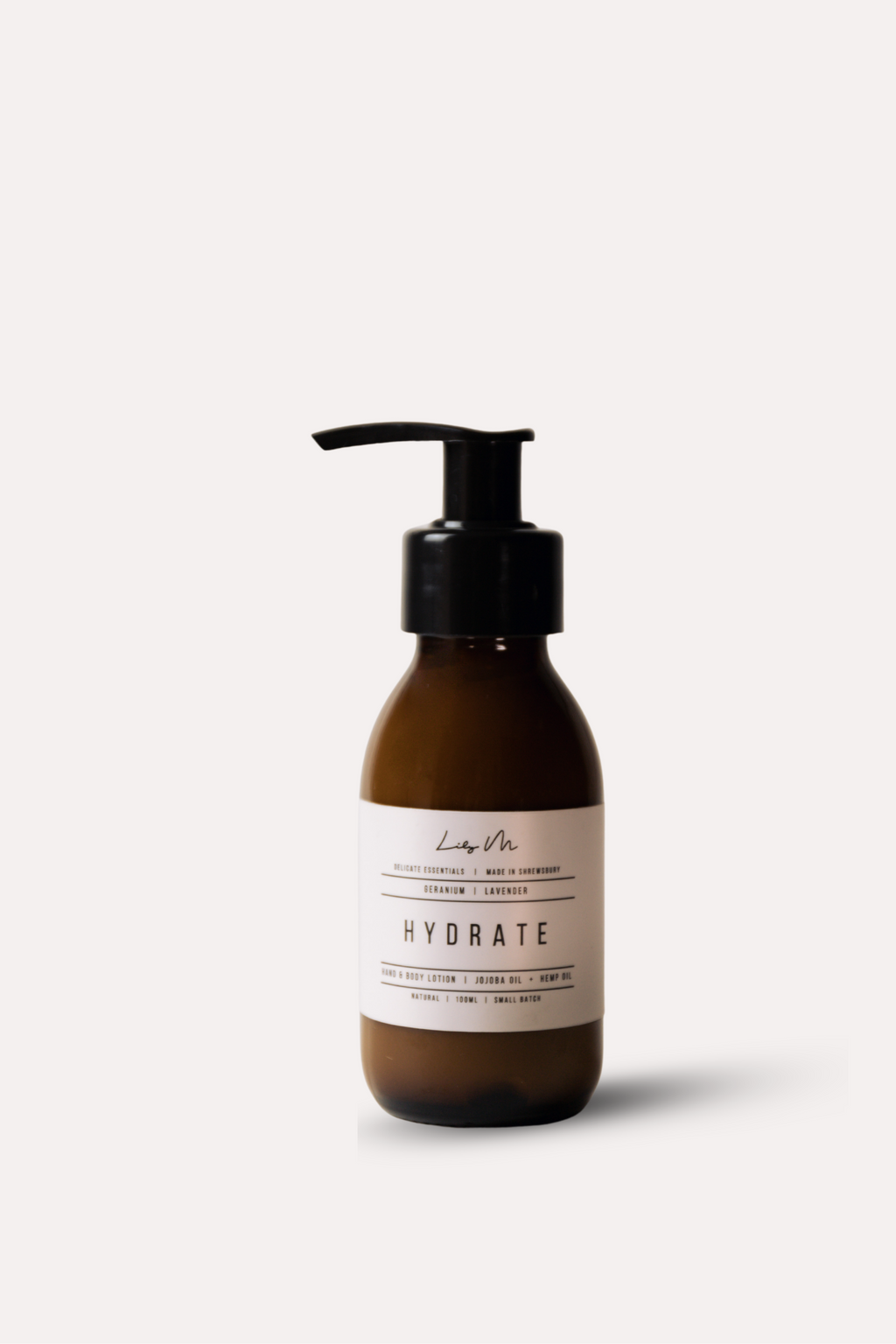 Skincare bottle labeled 'Hydrate' on a white background