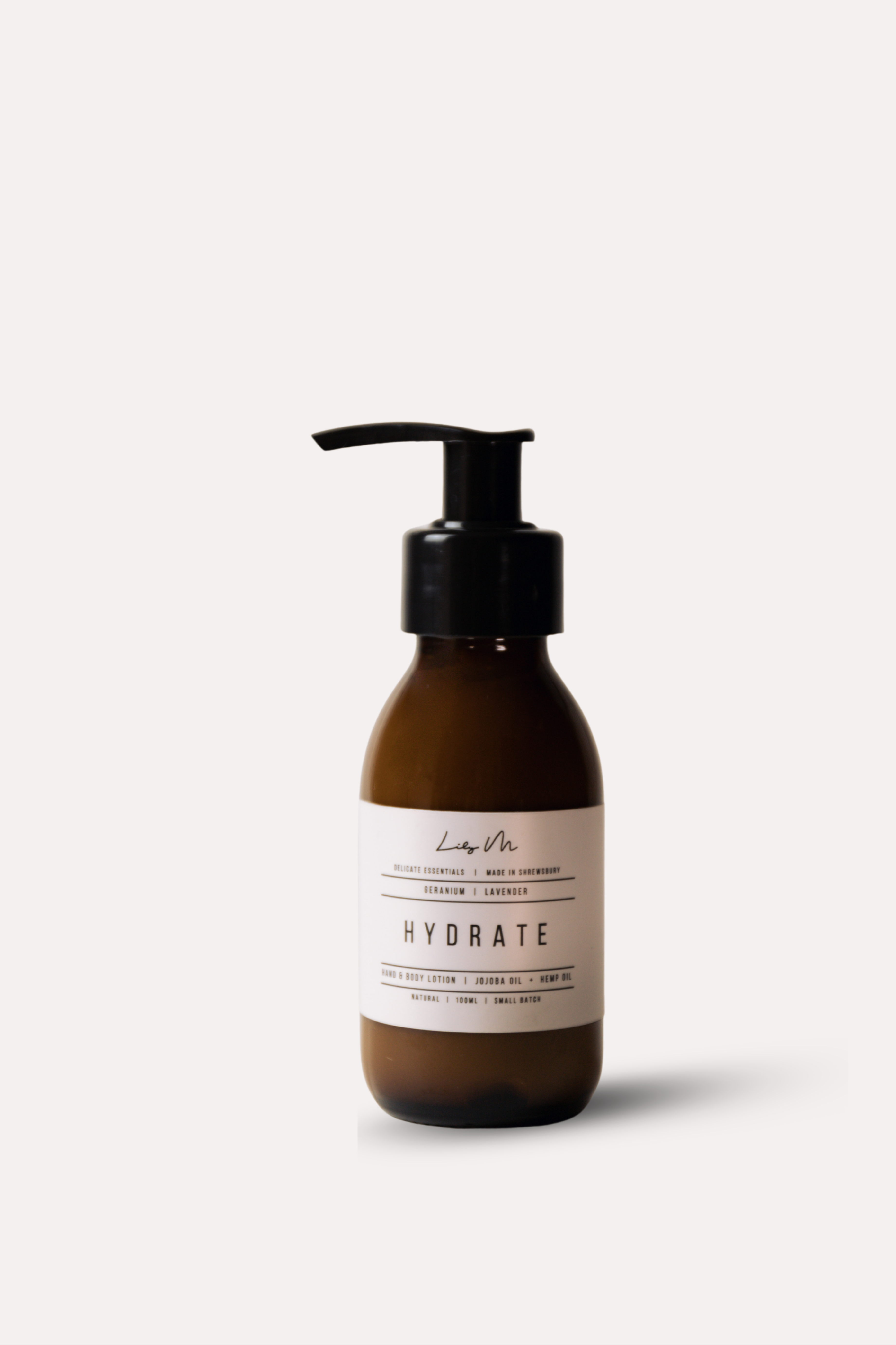 Skincare bottle labeled 'Hydrate' on a white background