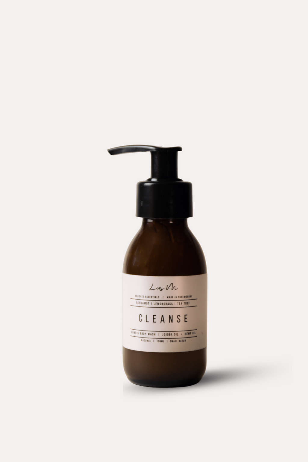 Brown bottle with pump and 'Cleanse' label on a white background