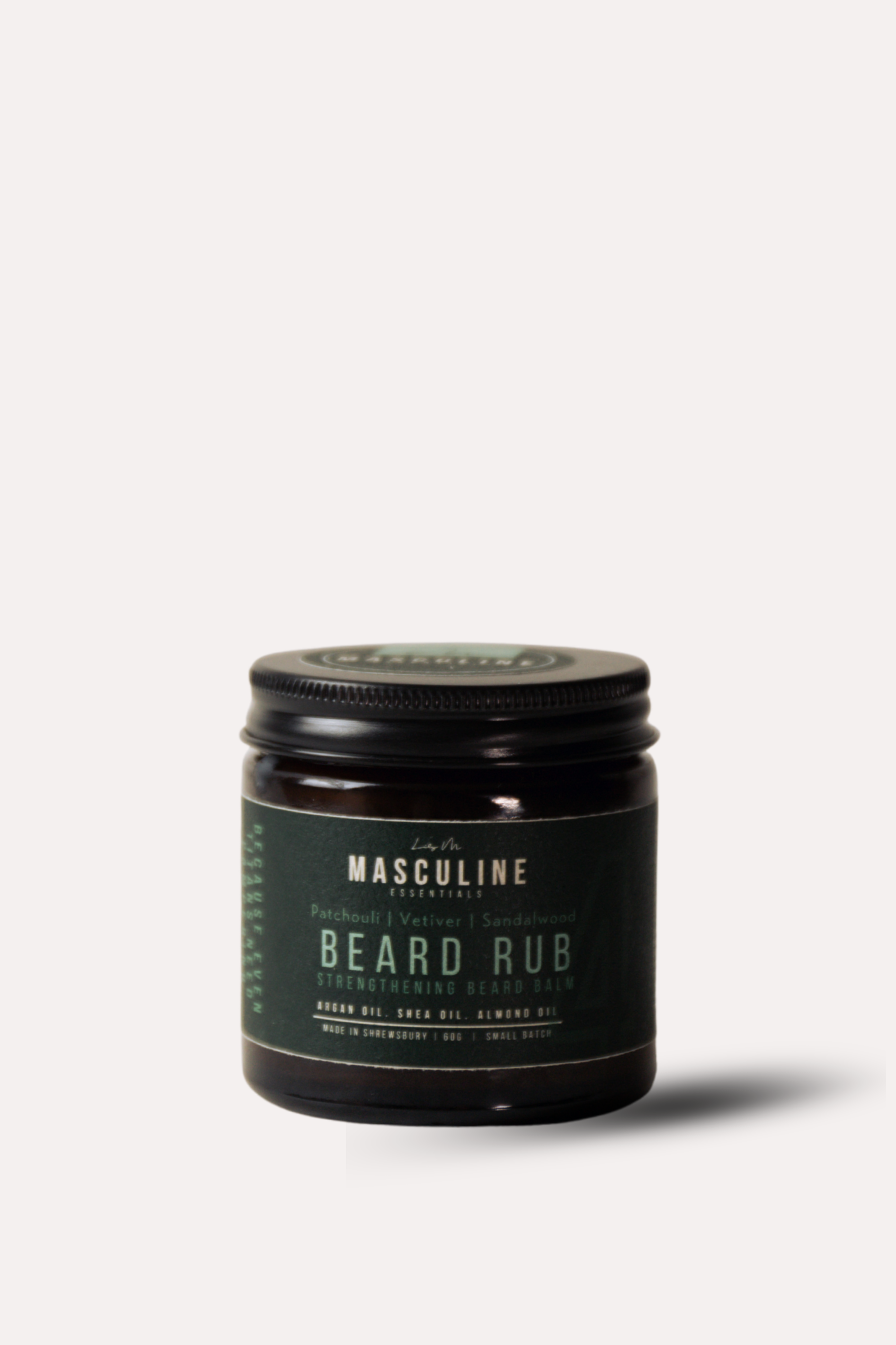 Jar of Masculine Beard Rub on a white background