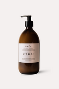 Brown bottle with pump and 'Hydrate' label on a white background