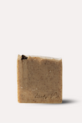 Bar of soap with a visible brand logo on a white background