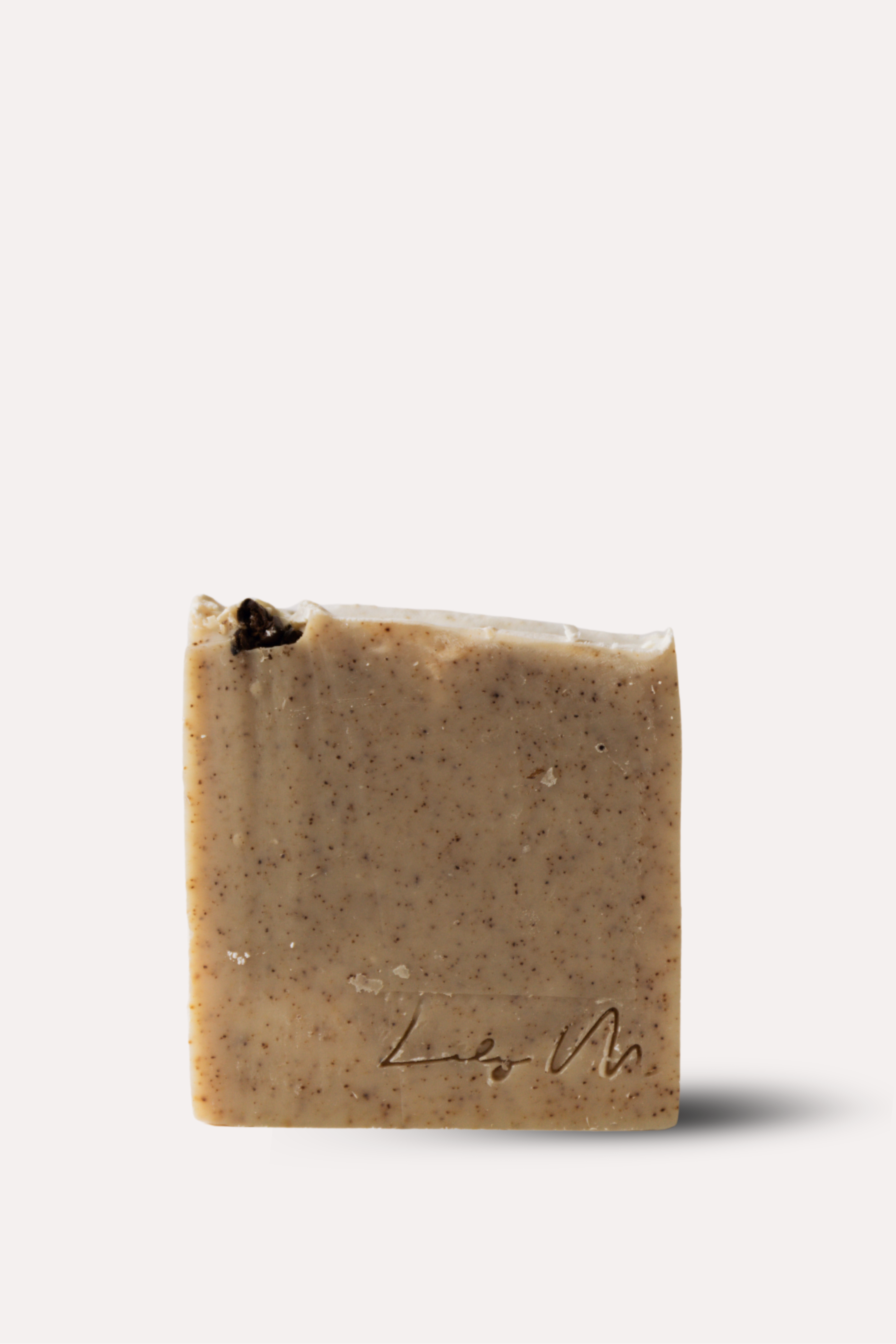 Bar of soap with a visible brand logo on a white background