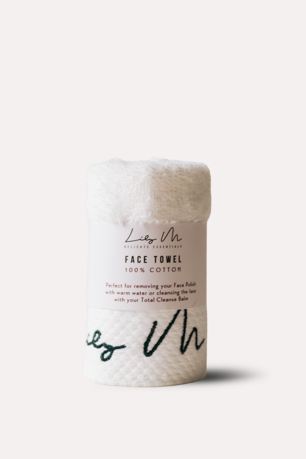 Face towel with branding on a white background