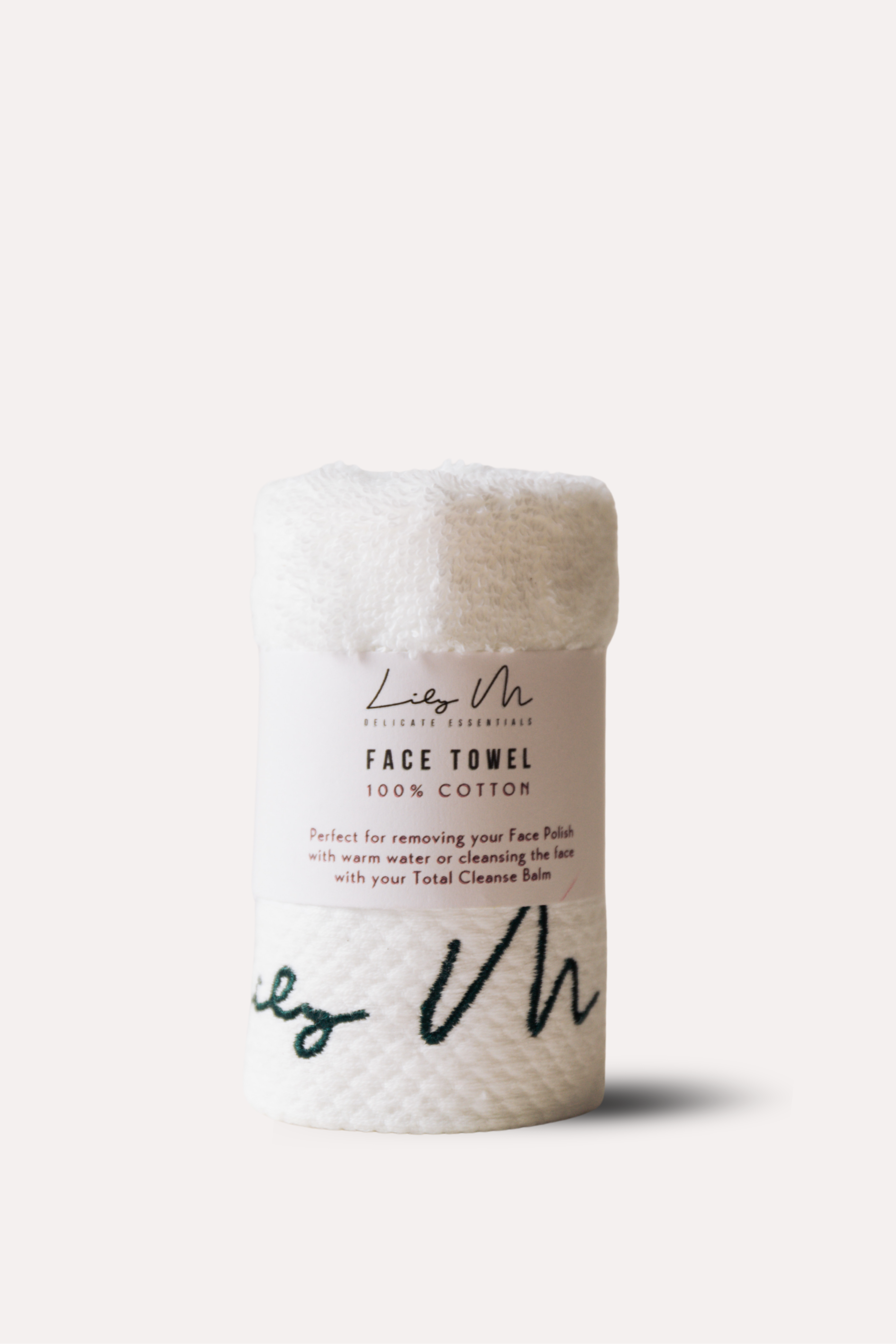 Face towel with branding on a white background