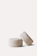 Two lavender bath bombs on a white background 