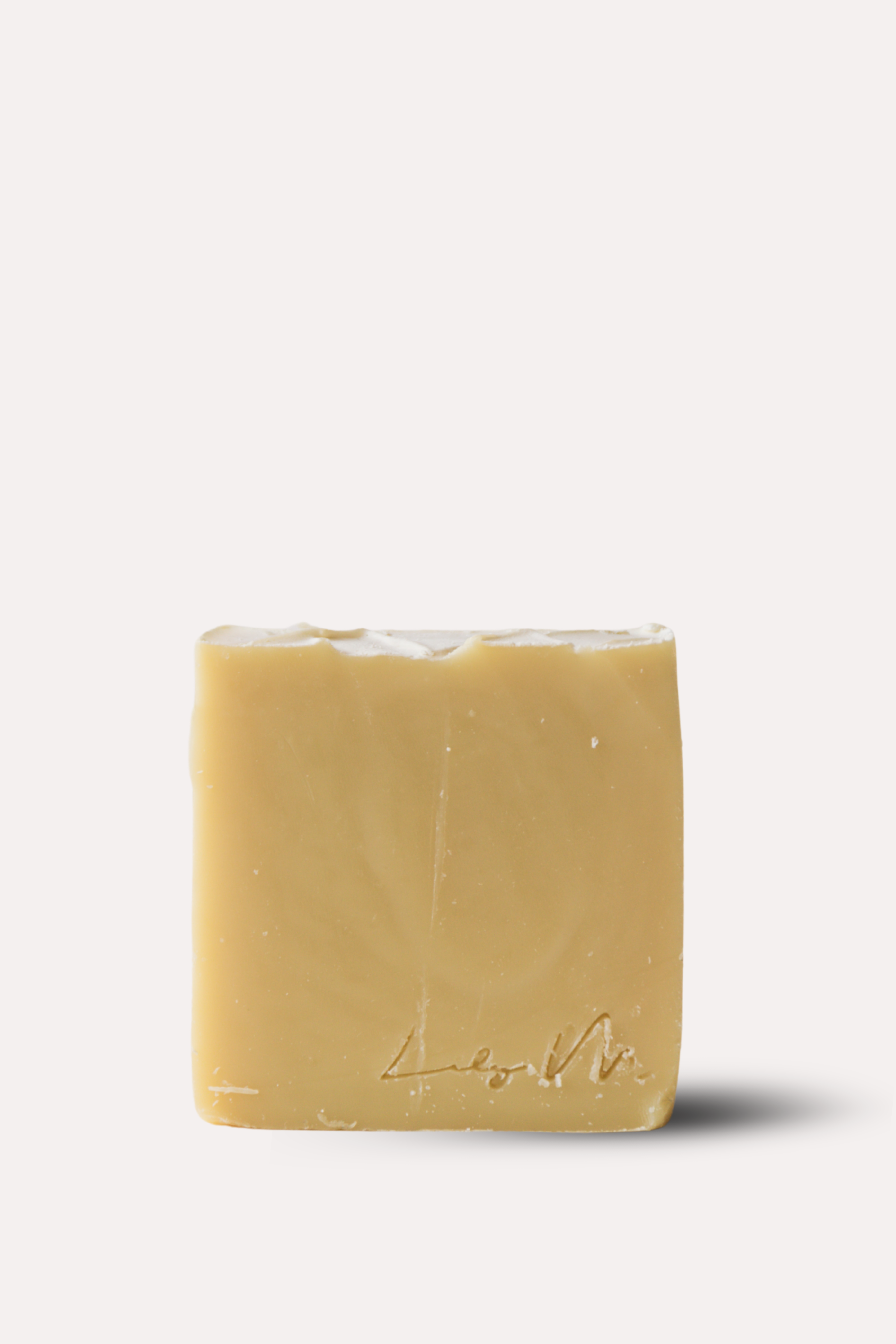Bar of soap with a brand logo on a white background