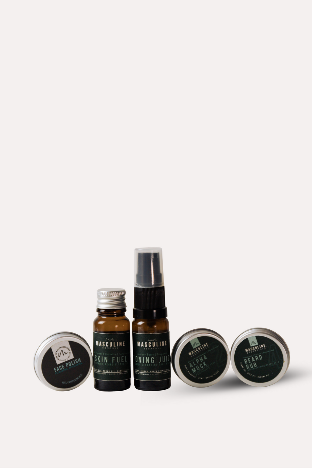 Set of skincare products including bottles and jars on a white background -mens skincare kit