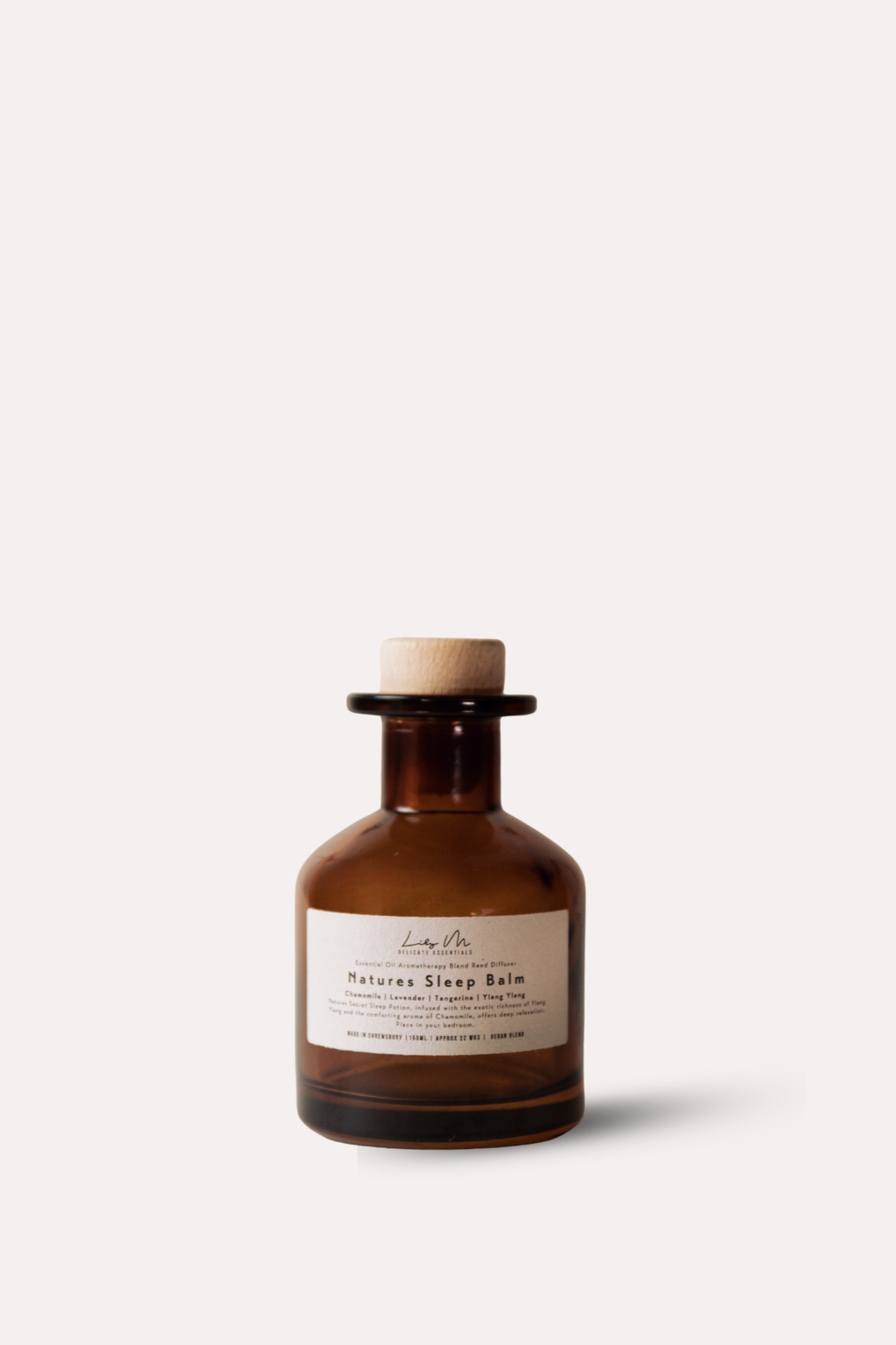 Brown bottle with a label on a white background
