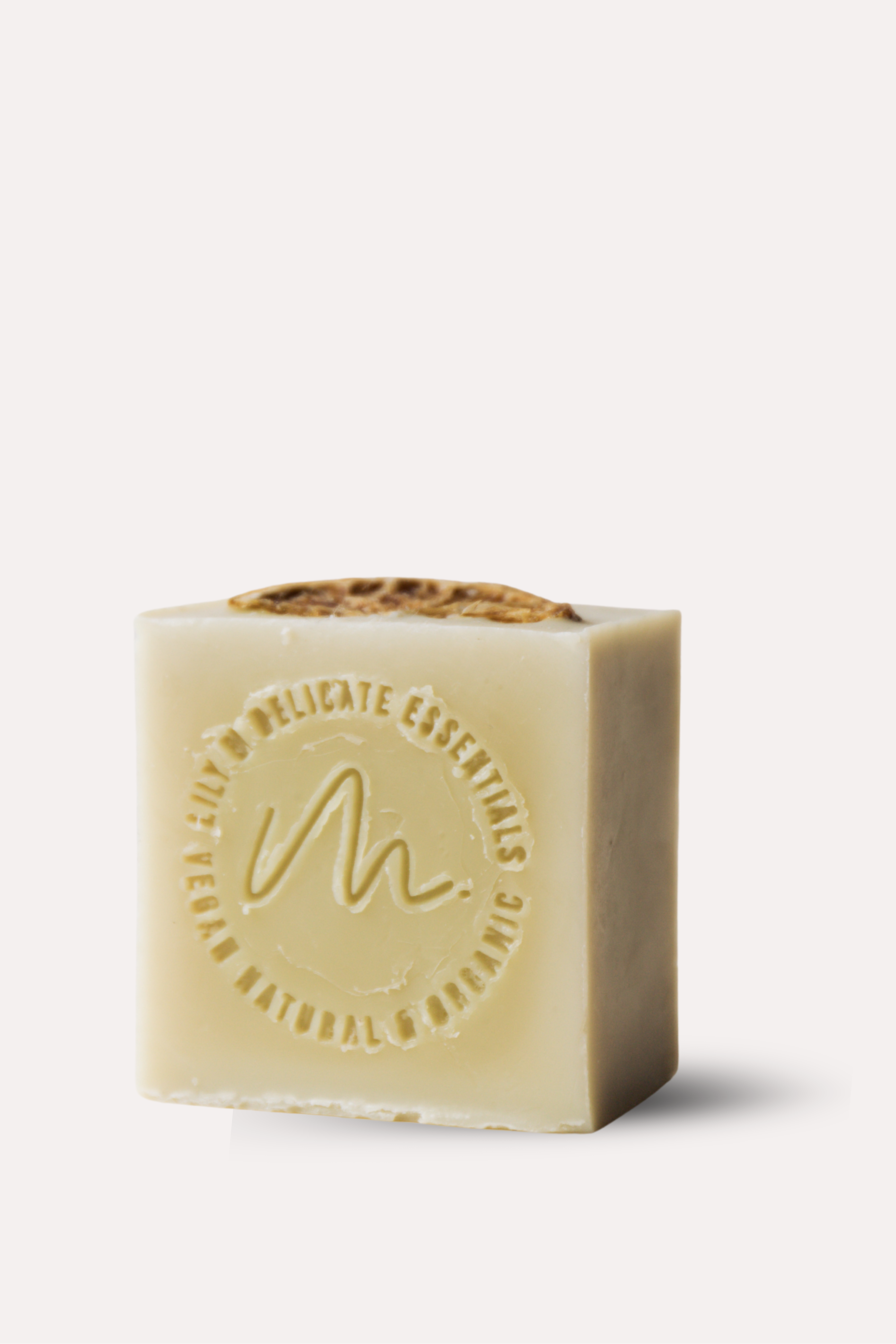 Bar of soap with a logo on a white background