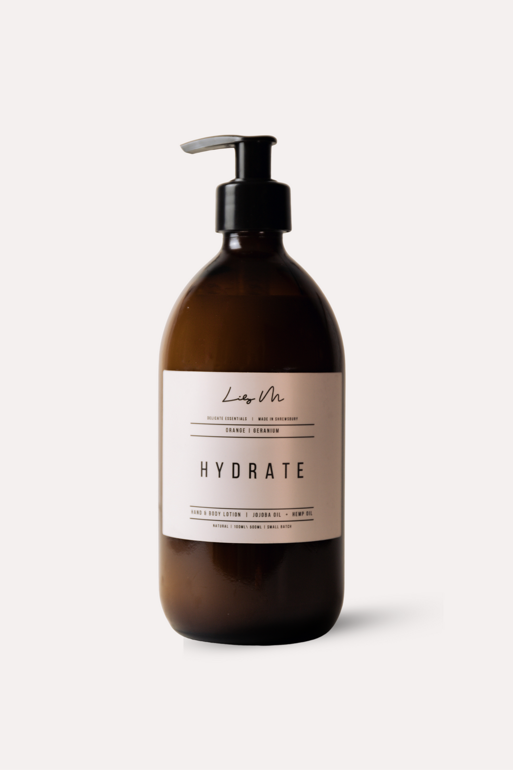 Brown bottle with pump and 'Hydrate' label on a white background