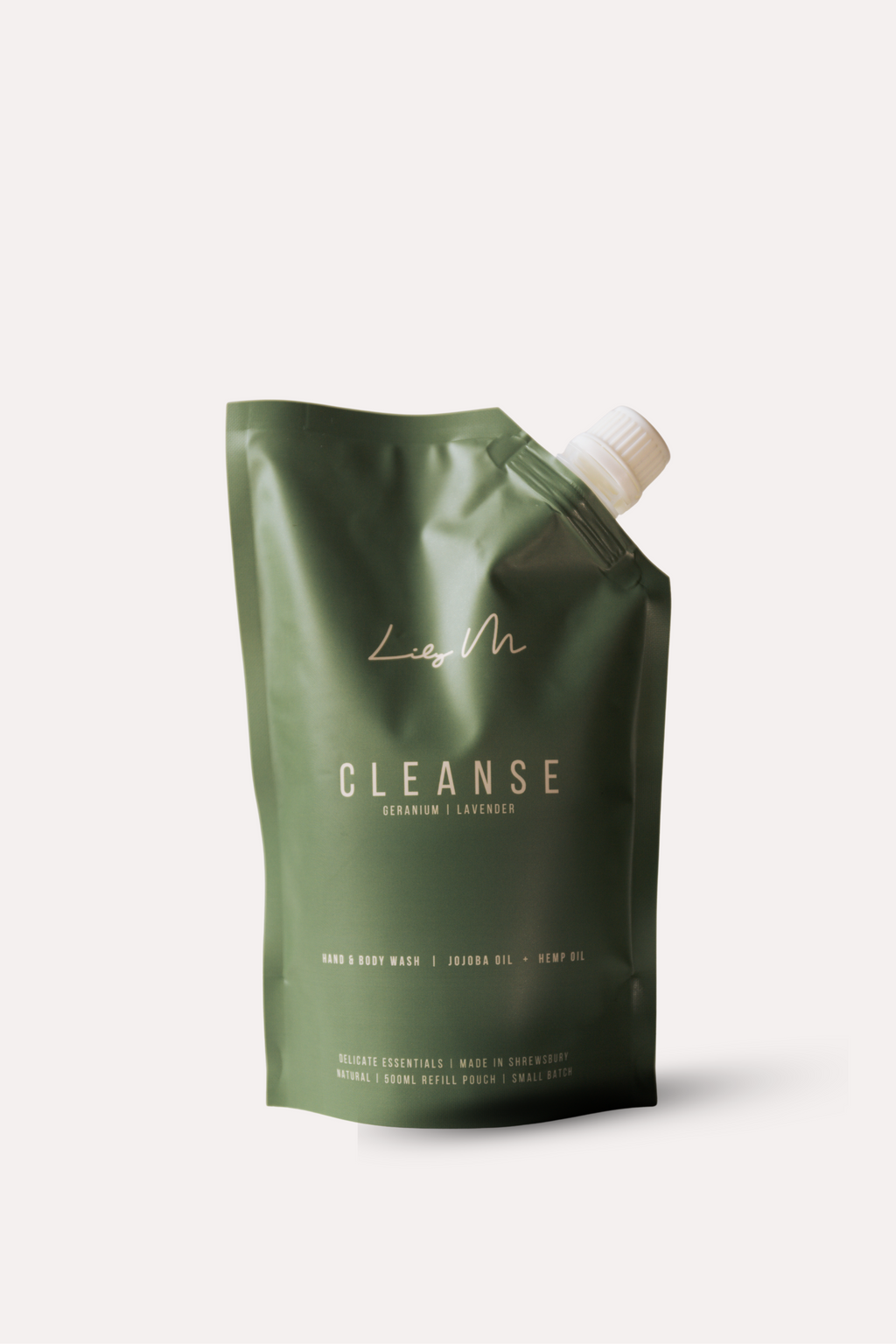 Green packaging of a product labeled 'Cleanse' on a white background refill pouch