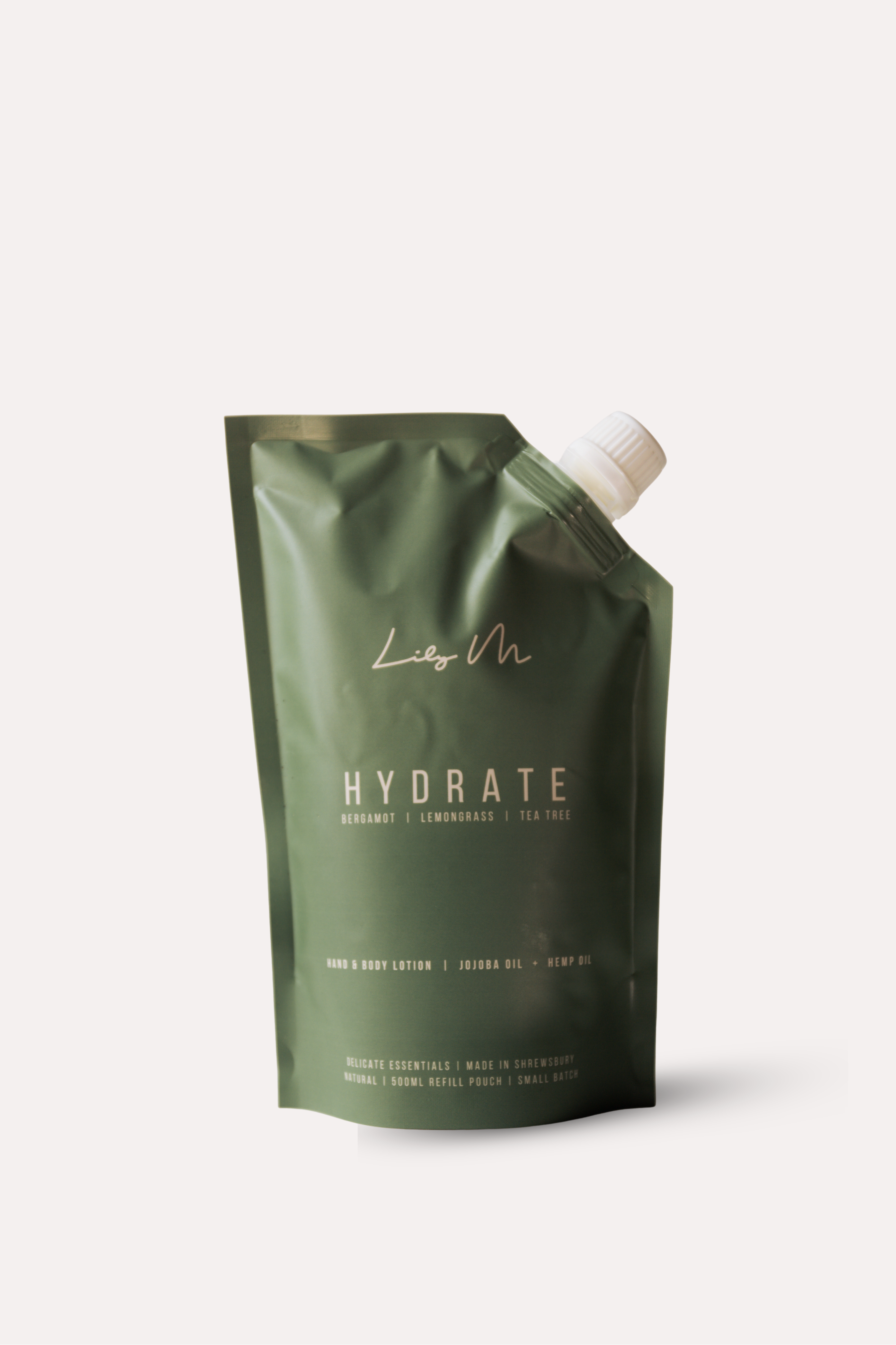 Green refill pouch labeled with 'Hydrate' on a white background