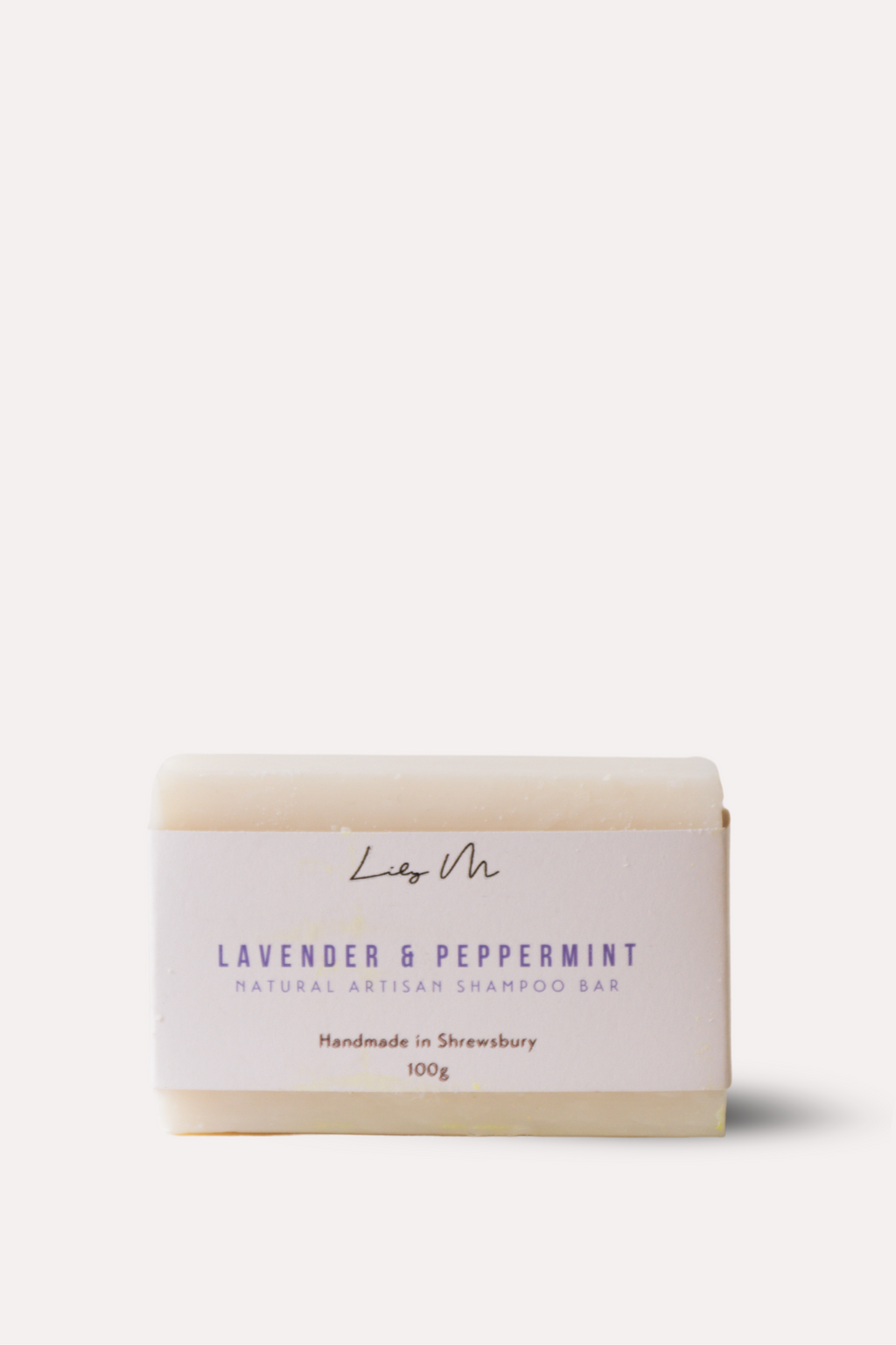 Bar of soap with a label on a white background