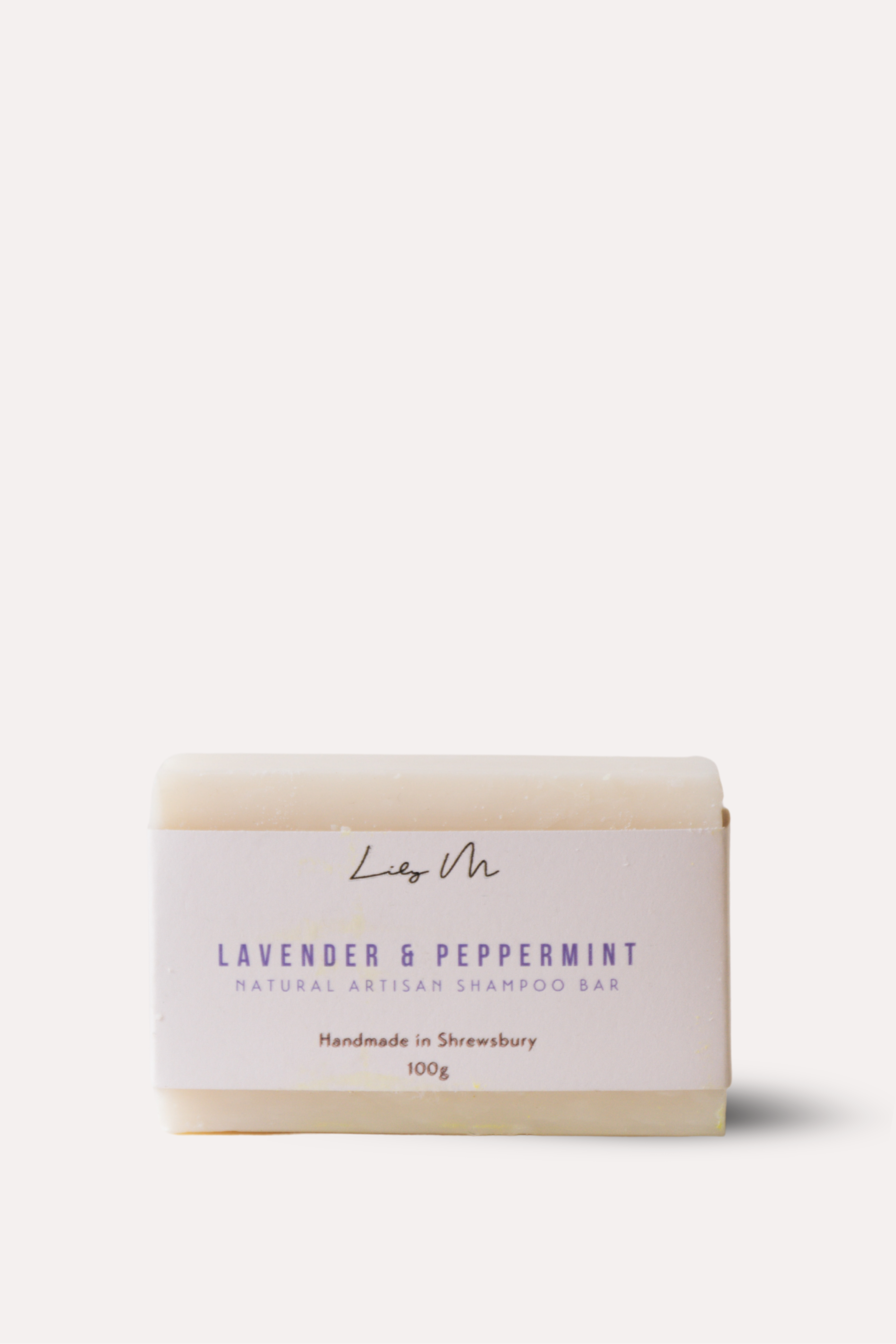 Bar of soap with a label on a white background