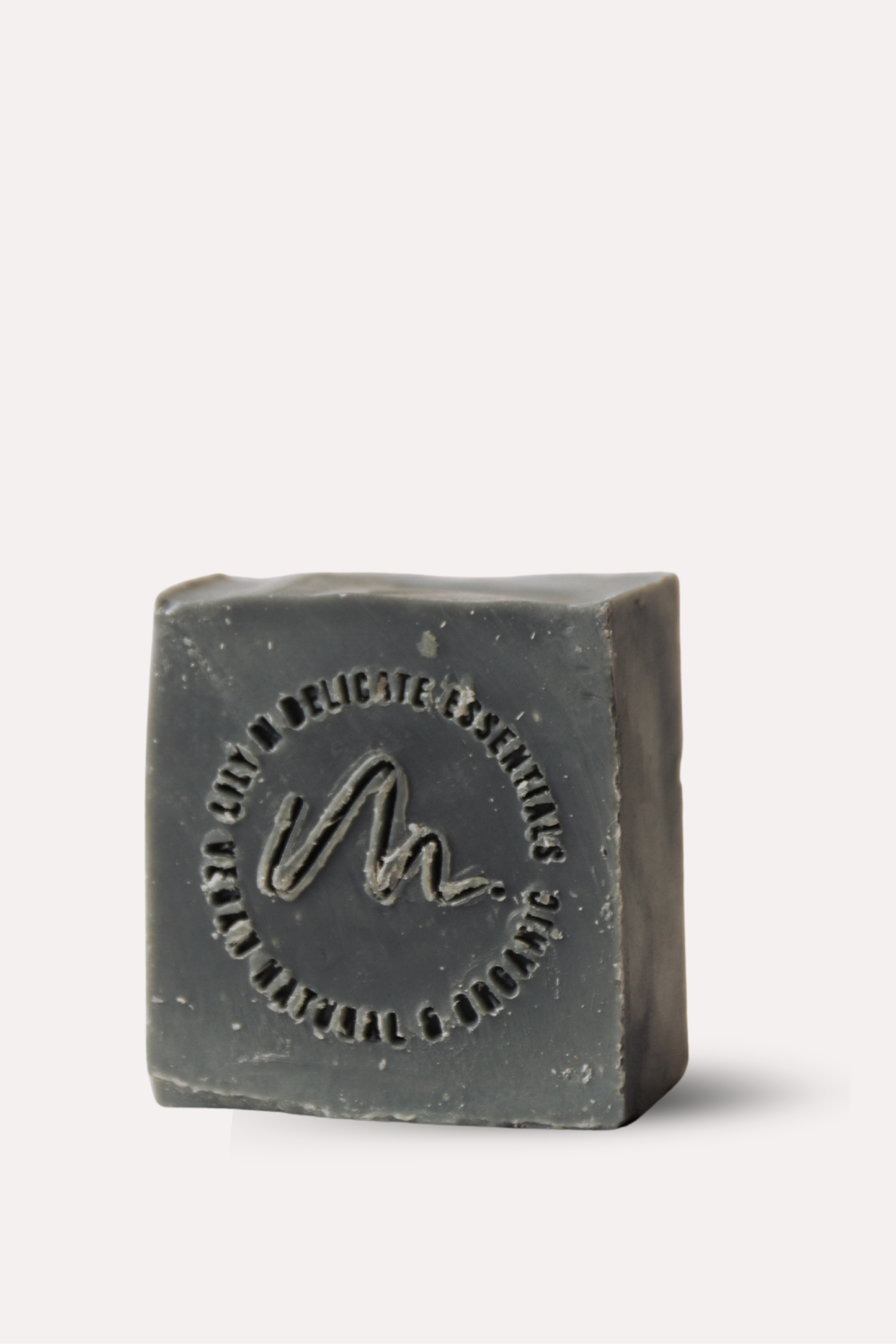Bar of soap with a brand logo on a white background