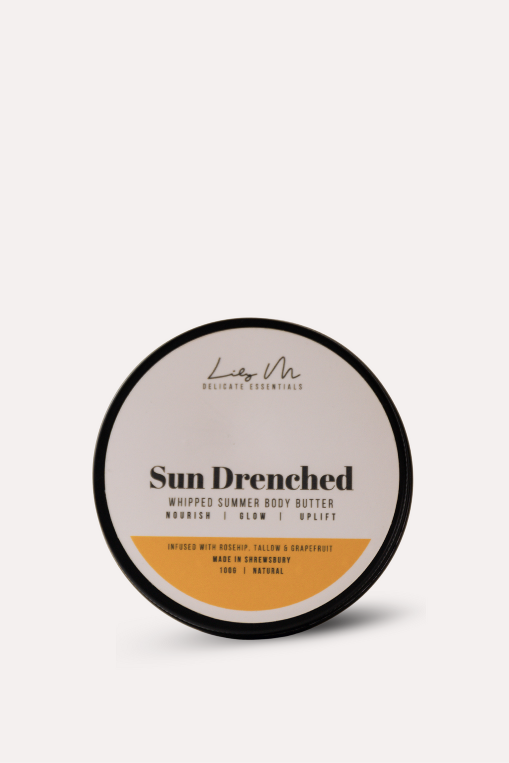 Sun Drenched whipped summer body butter container on a white background