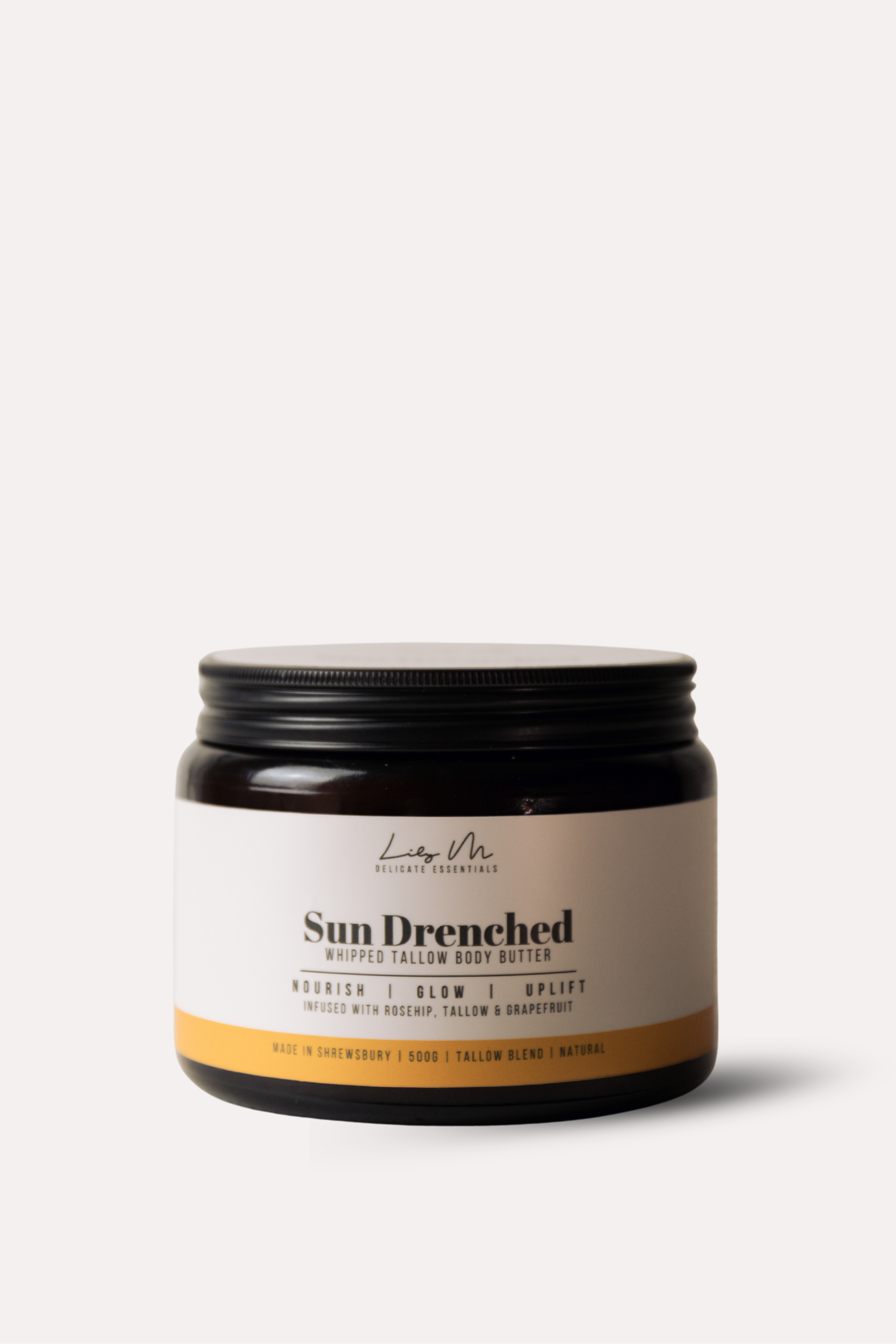 Jar of 'Sun Drenched' body butter on a white background