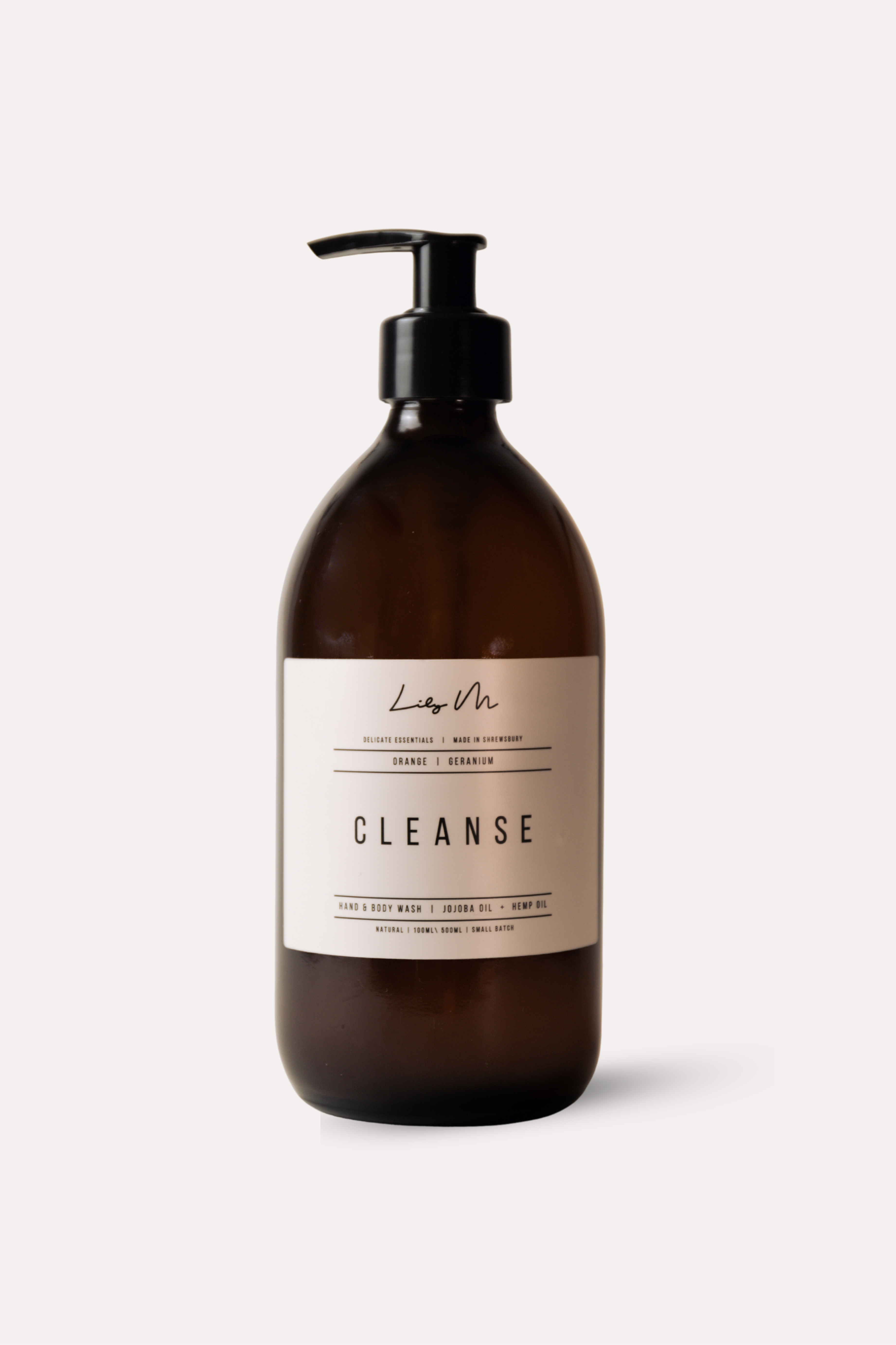 Brown bottle with pump labeled 'Cleanse' on a white background